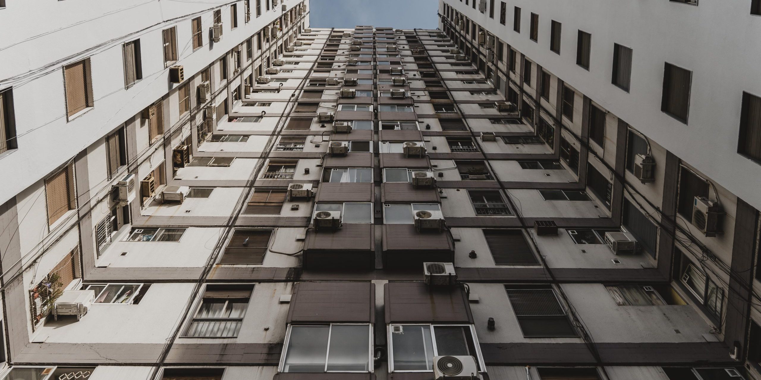 low-angle-massive-concrete-building-city