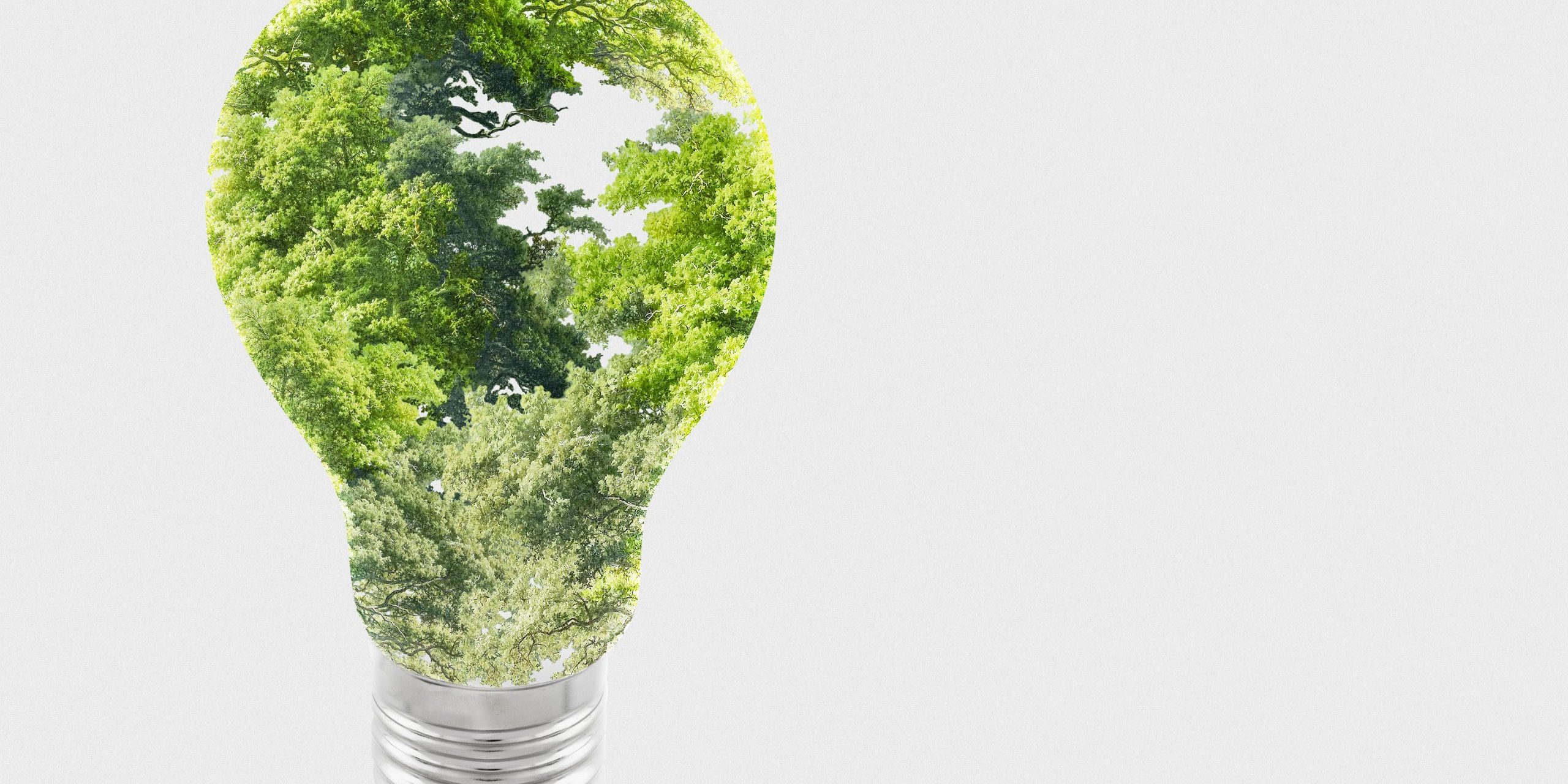 Hand catching a falling crushed plastic bottle